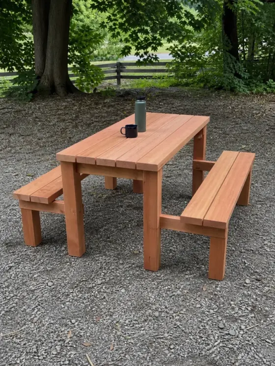 A finished straight-leg picnic table
